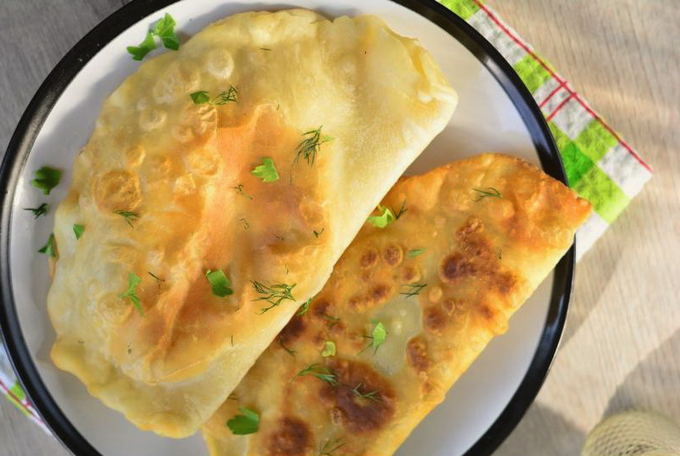 Chebureks with meat and mushrooms