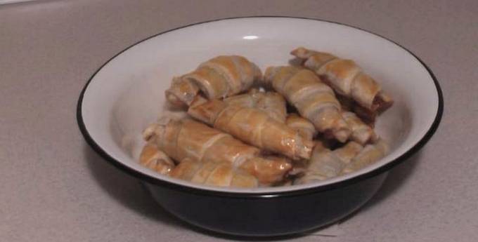 Puff yeast dough croissants with jam