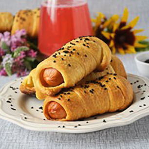 Beautiful sausages in puff yeast dough