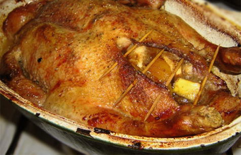 Duck with dried apricots and prunes in the oven