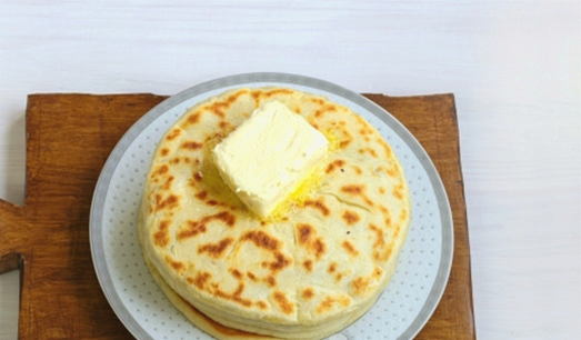 Tortillas with suluguni cheese in a pan