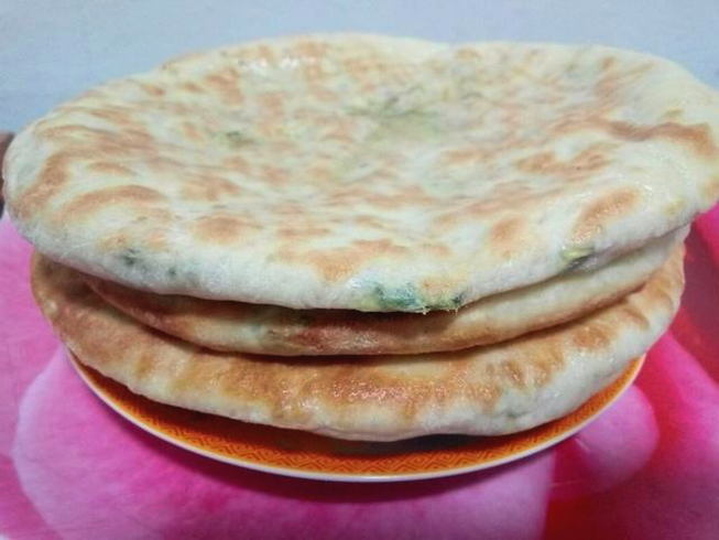 Tortillas with milk with cheese and herbs