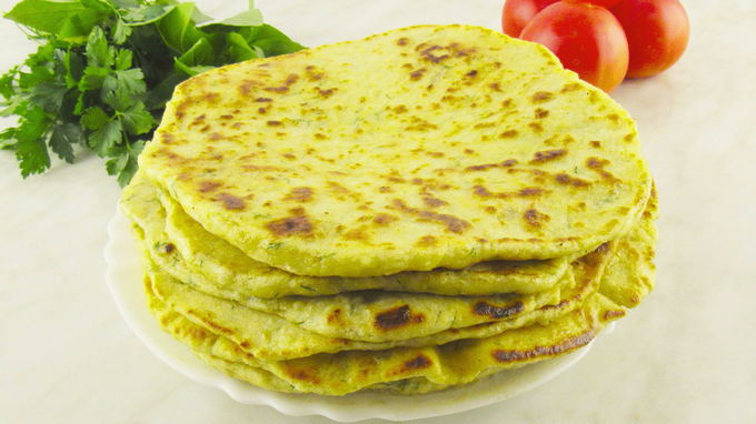 Tortillas with cheese, cottage cheese and egg in a pan