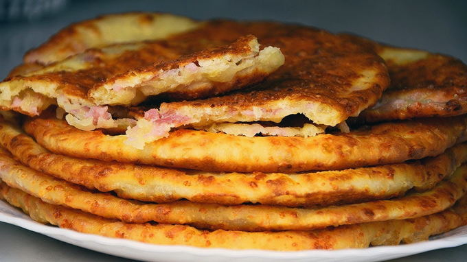 Tortilla with ham and cheese in the oven