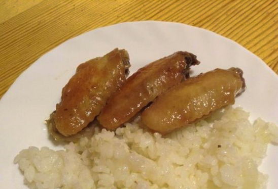 Wings in soy sauce with honey and garlic in a pan