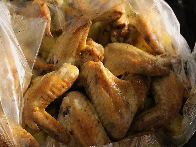 Wings in soy sauce with potatoes in the oven