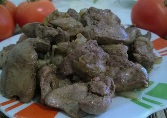 Chicken liver with onions in a pan