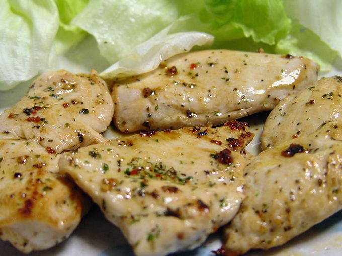 Chicken in honey-mustard sauce in a pan