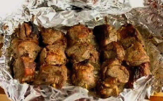 Pork pieces like a kebab in the oven