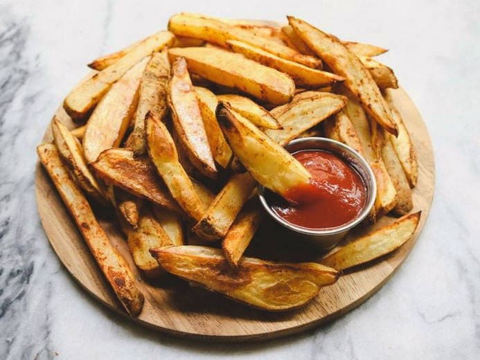 Rustic potato wedges baked in the oven