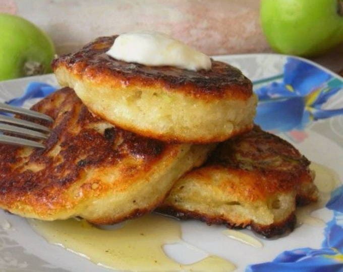 Pancakes with milk with apples and cottage cheese