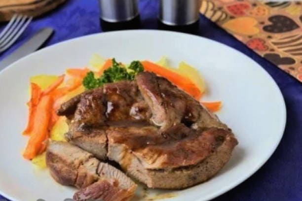 Turkey thigh steak in a pan