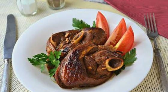 Turkey drumstick steak in a pan