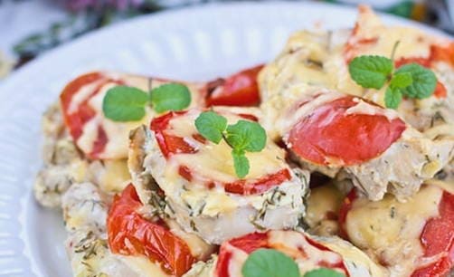 Turkey steak with tomatoes in the oven