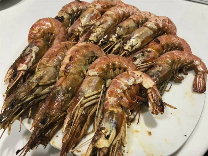Langoustines with soy sauce on the grill