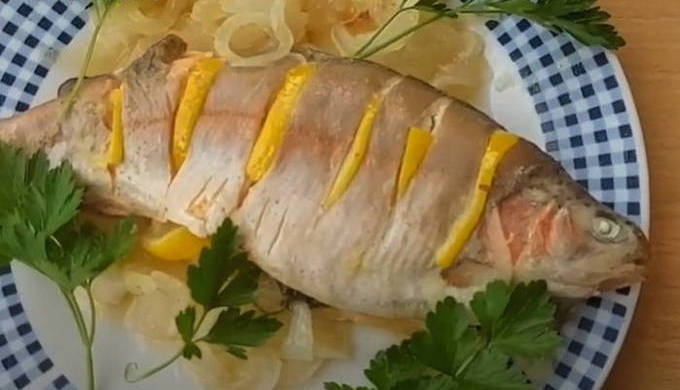 Whole trout in foil on the grill