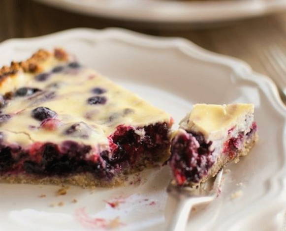 Lingonberry pie with sour cream filling in the oven