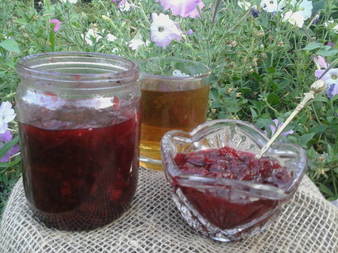Cherry plum jam with seeds with orange for the winter
