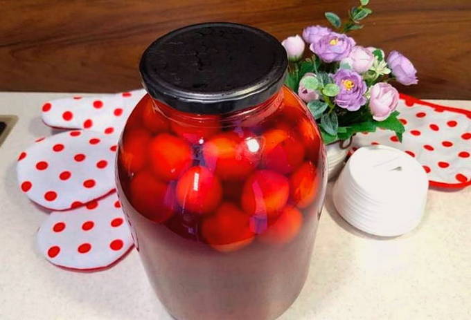 Cherry plum compote in a 2-liter jar for the winter