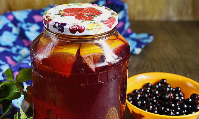 Blackcurrant and orange compote in a 3-liter jar for the winter