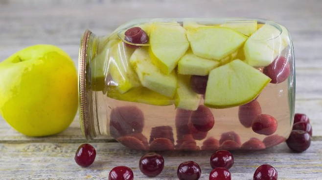 Cherry and apple compote in a 2-liter jar for the winter