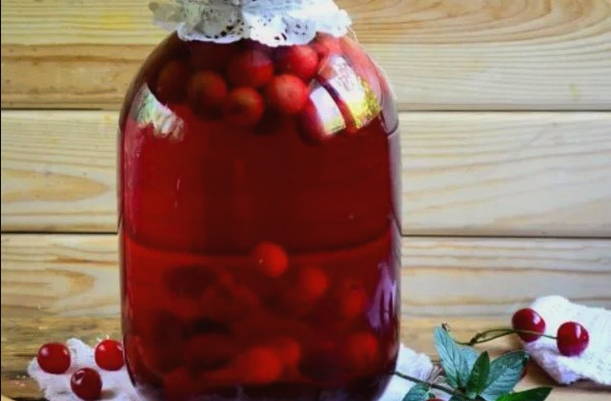 Pear and cherry compote in a 3-liter jar for the winter