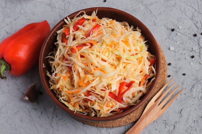 Pickled cabbage with carrots and instant peppers