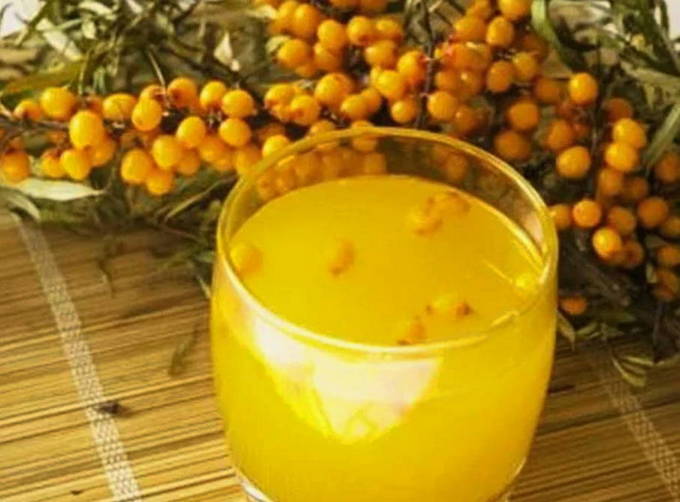 Sea buckthorn compote in a 1-liter jar for the winter